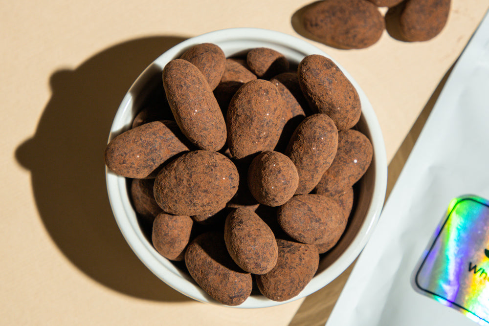 Whole Cacao Beans covered in dark chocolate